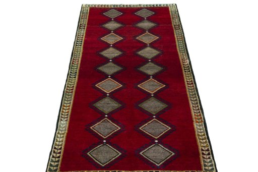 Surface texture of 2000s Persian Gabbeh rug with natural Wool and intricate pattern