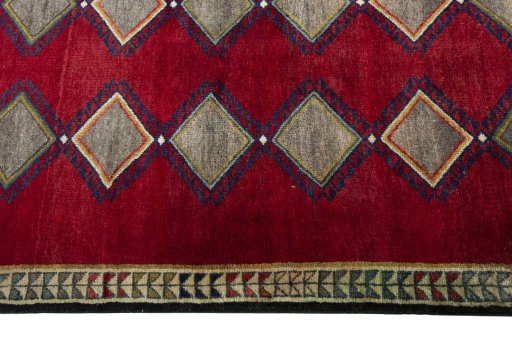 Close-up detail of 2000s Persian Gabbeh rug from Iran / Persia showing Wool weave
