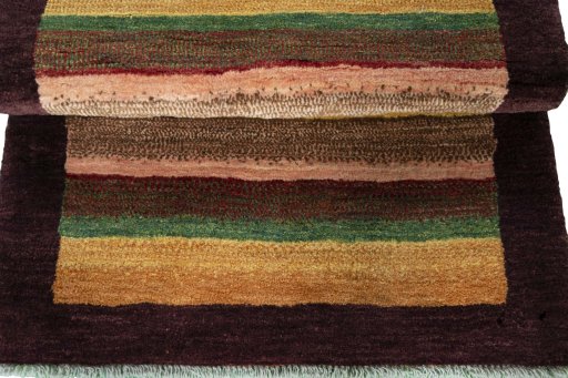 Full view of 2000s Persian Gabbeh rug from Iran / Persia, 120 × 83 cm in Multi Color tones