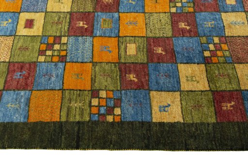 Close-up detail of 2000s Persian Gabbeh rug from Iran / Persia showing Wool weave