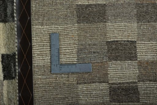 Close-up detail of 2000s Persian Gabbeh rug from Iran / Persia showing Wool weave