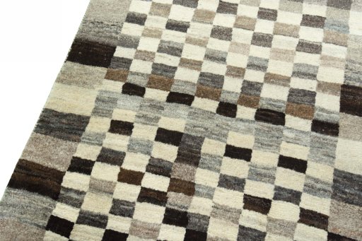 Backside of handmade 2000s Persian Gabbeh rug showing knot structure and weave density