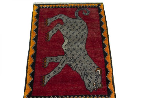 Surface texture of 2000s Persian Gabbeh rug with natural Wool and intricate pattern