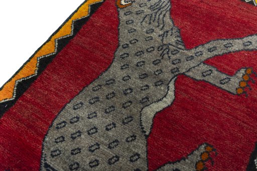 Backside of handmade 2000s Persian Gabbeh rug showing knot structure and weave density