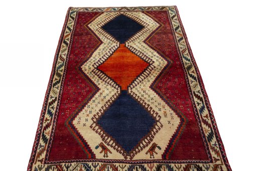 Surface texture of 2000s Persian Gabbeh rug with natural Wool and intricate pattern