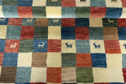 Full view of 2000s Persian Gabbeh rug from Iran / Persia, 150 × 101 cm in Multi Color tones