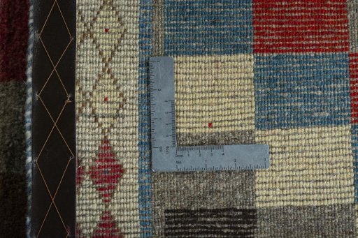 Close-up detail of 2000s Persian Gabbeh rug from Iran / Persia showing Wool weave