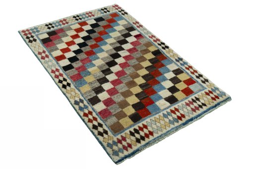 Close-up detail of 2000s Persian Gabbeh rug from Iran / Persia showing Wool weave