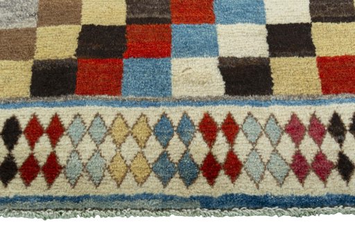 Central medallion detail of 2000s Persian Gabbeh rug from Iran / Persia