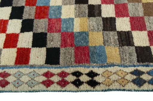 Close-up detail of 2000s Persian Gabbeh rug from Iran / Persia showing Wool weave