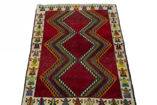 Surface texture of 2000s Persian Gabbeh rug with natural Wool and intricate pattern