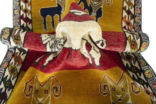 Corner detail of 2000s Persian Gabbeh rug showing border pattern and Wool pile