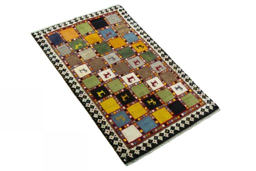 Close-up detail of 2000s Persian Gabbeh rug from Iran / Persia showing Wool weave