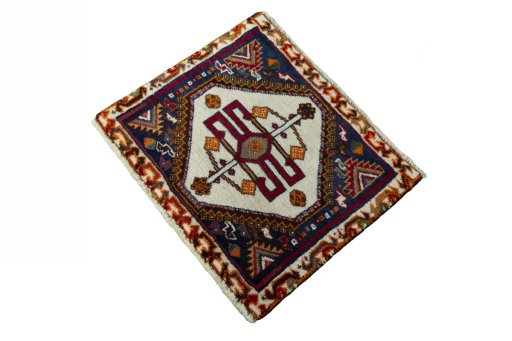 Corner detail of 2000s Persian Gabbeh rug showing border pattern and Wool pile