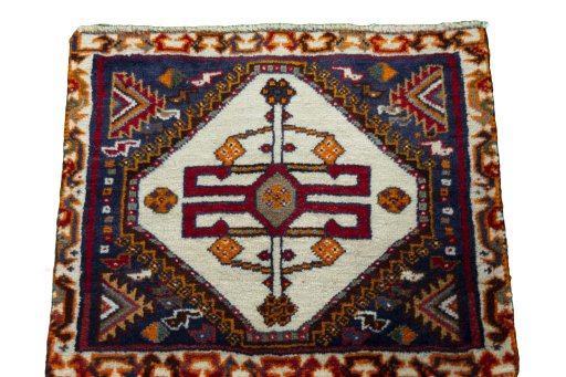 Surface texture of 2000s Persian Gabbeh rug with natural Wool and intricate pattern