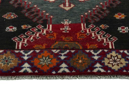 Central medallion detail of 2000s Persian Gabbeh rug from Iran / Persia