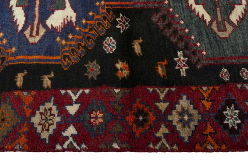 Close-up detail of 2000s Persian Gabbeh rug from Iran / Persia showing Wool weave