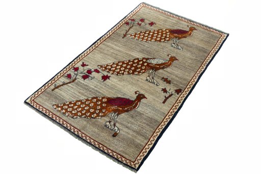 Corner detail of 2000s Persian Gabbeh rug showing border pattern and Wool pile