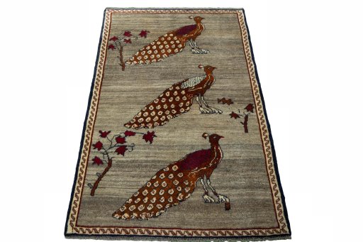 Surface texture of 2000s Persian Gabbeh rug with natural Wool and intricate pattern