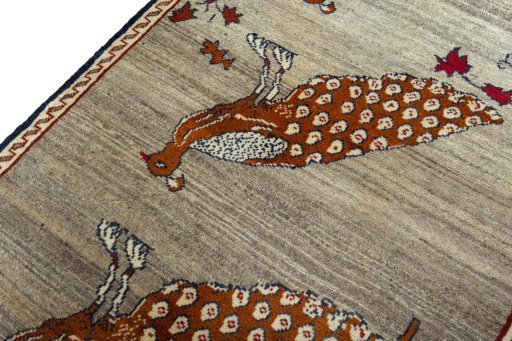 Backside of handmade 2000s Persian Gabbeh rug showing knot structure and weave density