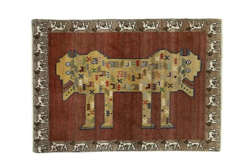 Full view of 2000s Persian Gabbeh rug from Iran / Persia, 152 × 107 cm in Red tones