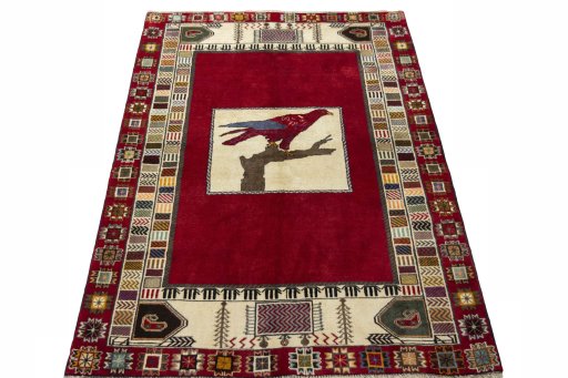 Surface texture of 2000s Persian Gabbeh rug with natural Wool and intricate pattern