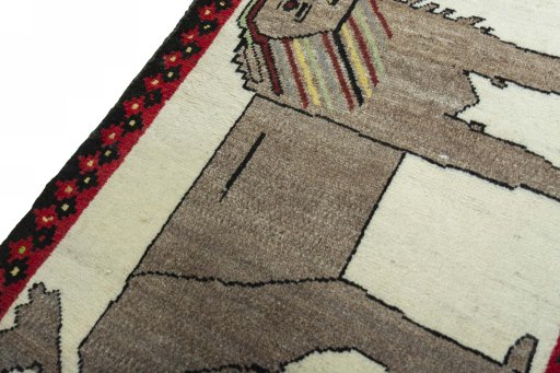 Backside of handmade 2000s Persian Gabbeh rug showing knot structure and weave density