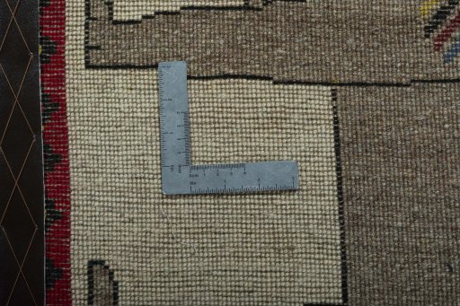 Full view of 2000s Persian Gabbeh rug from Iran / Persia, 94 × 61 cm in Beige tones