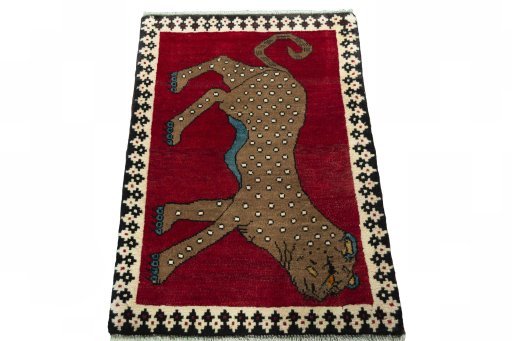 Surface texture of 2000s Persian Gabbeh rug with natural Wool and intricate pattern