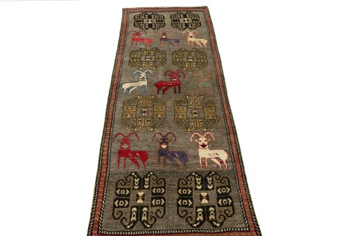Surface texture of 2000s Persian Gabbeh rug with natural Wool and intricate pattern