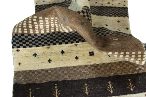 Close-up detail of 2000s Persian Gabbeh rug from Iran / Persia showing Wool weave