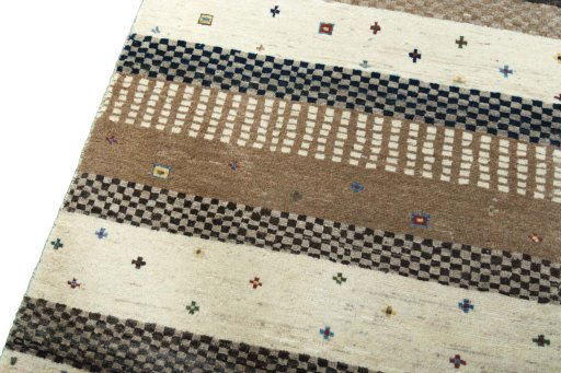 Backside of handmade 2000s Persian Gabbeh rug showing knot structure and weave density