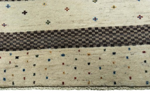 Close-up detail of 2000s Persian Gabbeh rug from Iran / Persia showing Wool weave