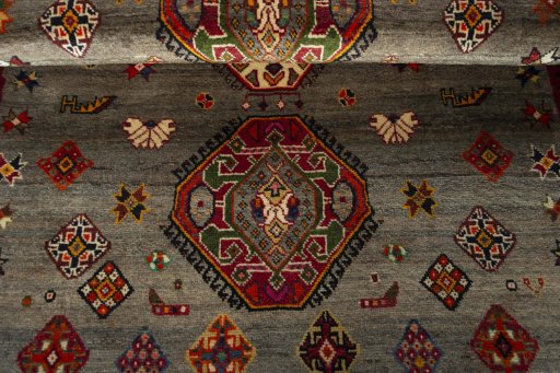 Full view of 2000s Persian Gabbeh rug from Iran / Persia, 200 × 132 cm in Beige tones