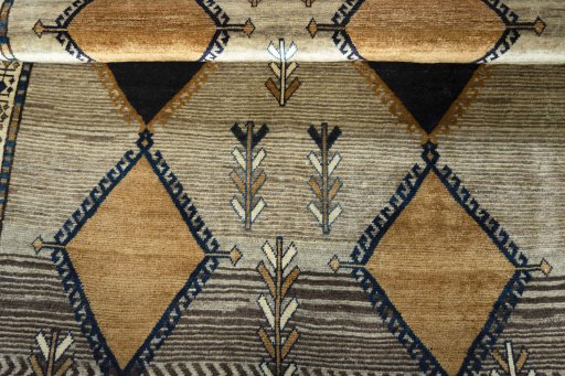 Full view of 1970s Persian Gabbeh rug from Iran / Persia, 190 × 135 cm in Beige tones