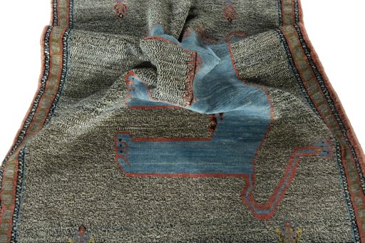 Corner detail of New Persian Gabbeh rug showing border pattern and Wool pile