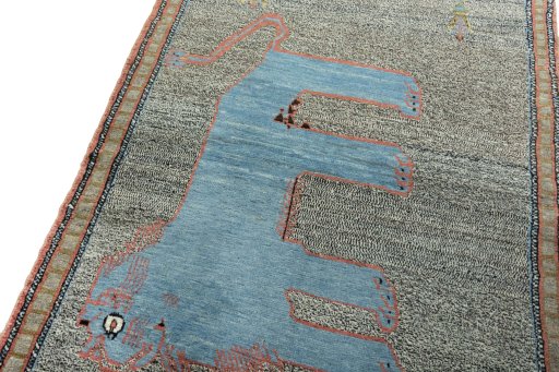 Backside of handmade New Persian Gabbeh rug showing knot structure and weave density