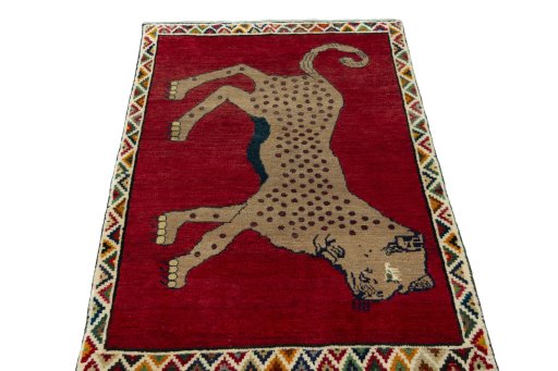 Surface texture of 2000s Persian Gabbeh rug with natural Wool and intricate pattern