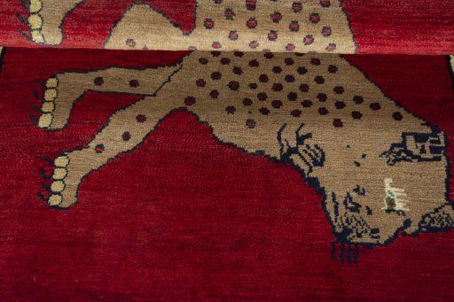 Full view of 2000s Persian Gabbeh rug from Iran / Persia, 144 × 95 cm in Red tones