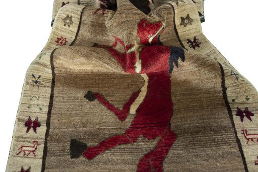 Corner detail of 2000s Persian Gabbeh rug showing border pattern and Wool pile