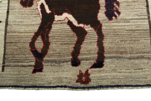 Central medallion detail of 2000s Persian Gabbeh rug from Iran / Persia