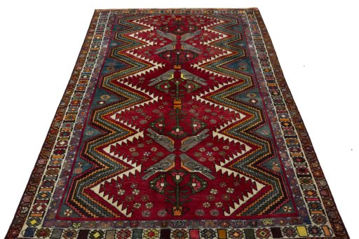Surface texture of 2000s Persian Gabbeh rug with natural Wool and intricate pattern