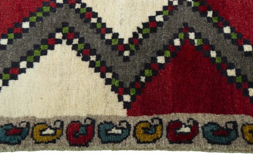 Close-up detail of 2000s Persian Gabbeh rug from Iran / Persia showing Wool weave
