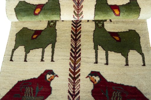 Full view of 2000s Persian Gabbeh rug from Iran / Persia, 174 × 78 cm in Beige tones