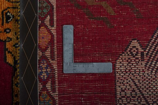 Surface texture of 2000s Persian Gabbeh rug with natural Wool and intricate pattern