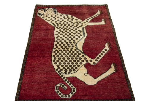 Surface texture of 2000s Persian Gabbeh rug with natural Wool and intricate pattern
