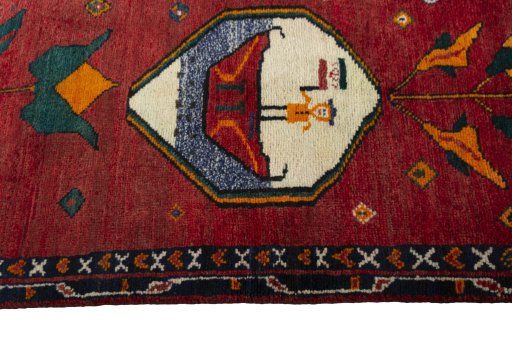 Full view of 2000s Persian Gabbeh rug from Iran / Persia, 250 × 78 cm in Red tones