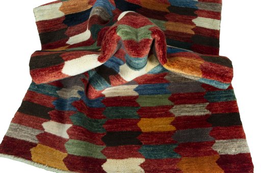 Corner detail of New Persian Gabbeh rug showing border pattern and Wool pile
