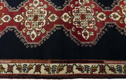 Close-up detail of 2000s Persian Gabbeh rug from Iran / Persia showing Wool weave