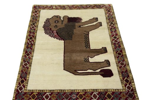 Surface texture of 2000s Persian Gabbeh rug with natural Wool and intricate pattern